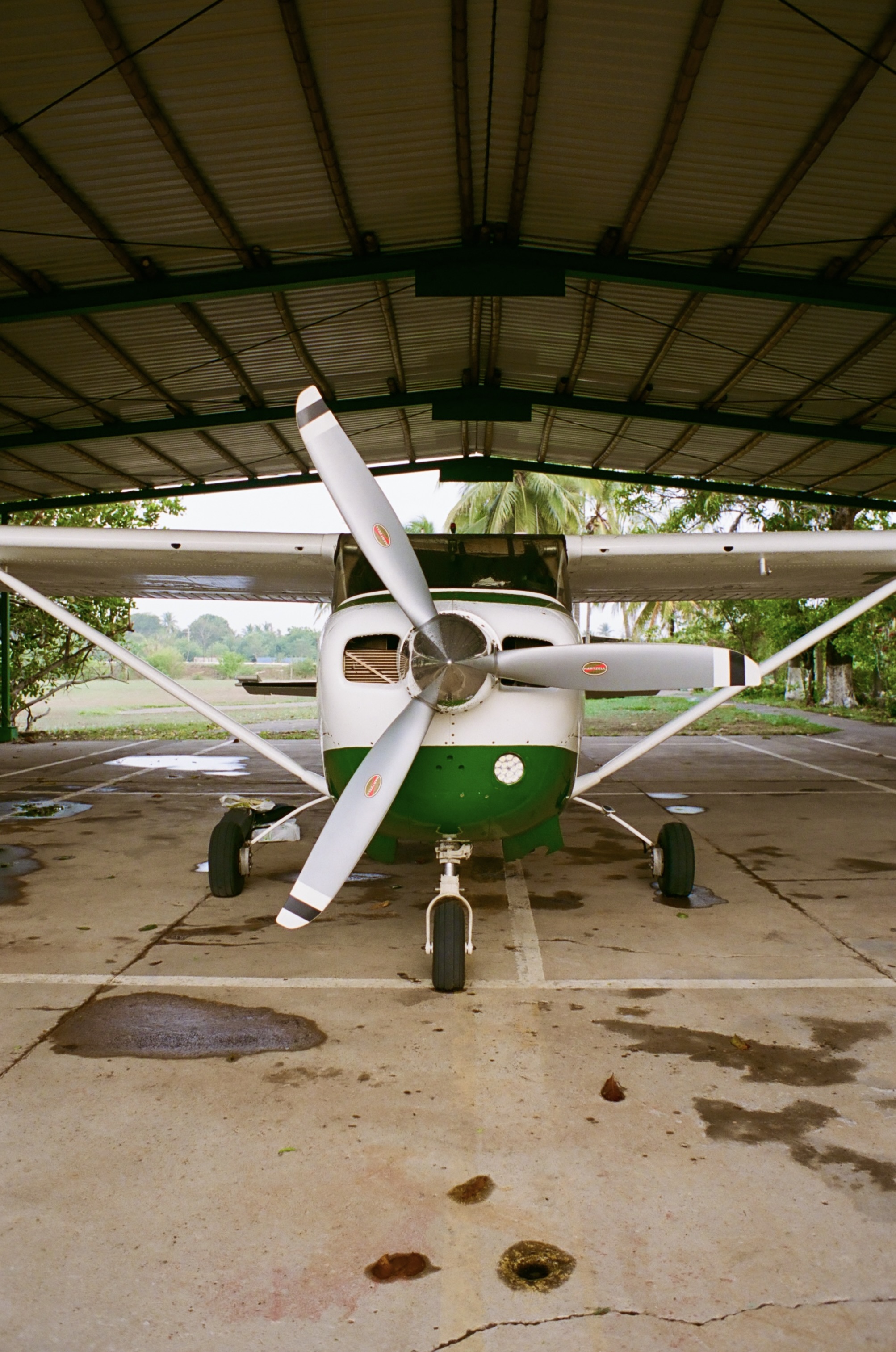 Two aircraft under one hangar roof — a visual metaphor for M&A communications and post-merger integration by Man of the World